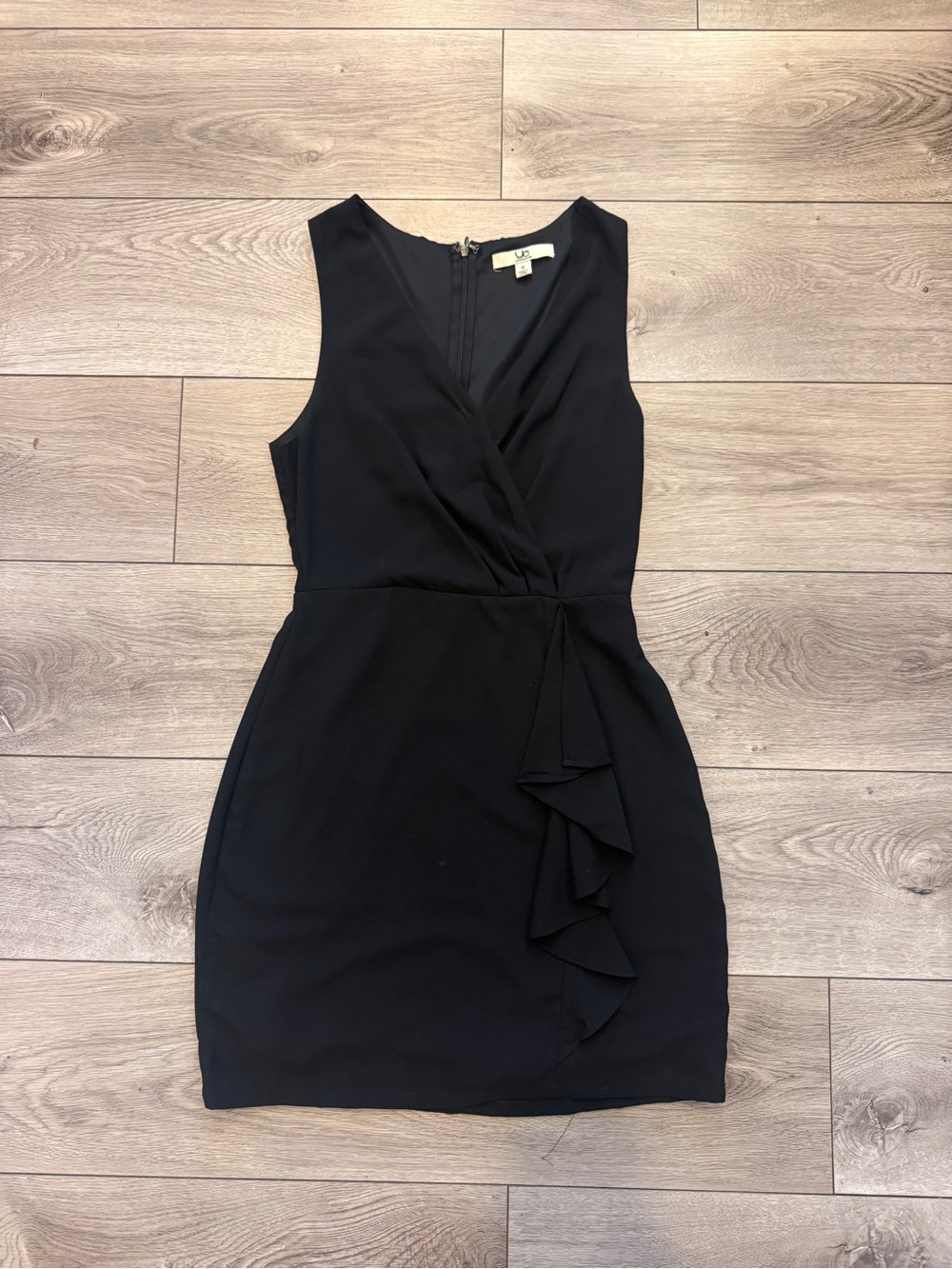Classic Black Sleeveless Mini Dress with Front Ruffle